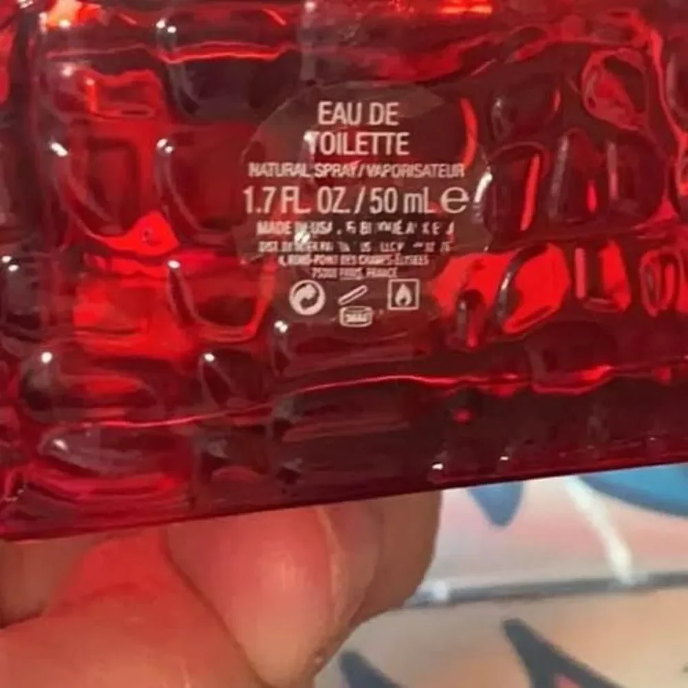 2.5 ounce bottle of Guess Seductive Red EDP